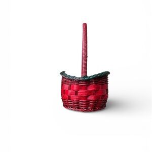 Small, round, Red woven basket with a handle And Green Trim